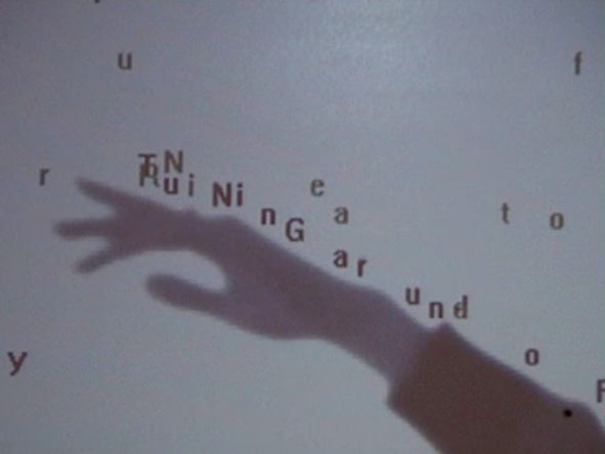 Text Rain di Camille Utterback